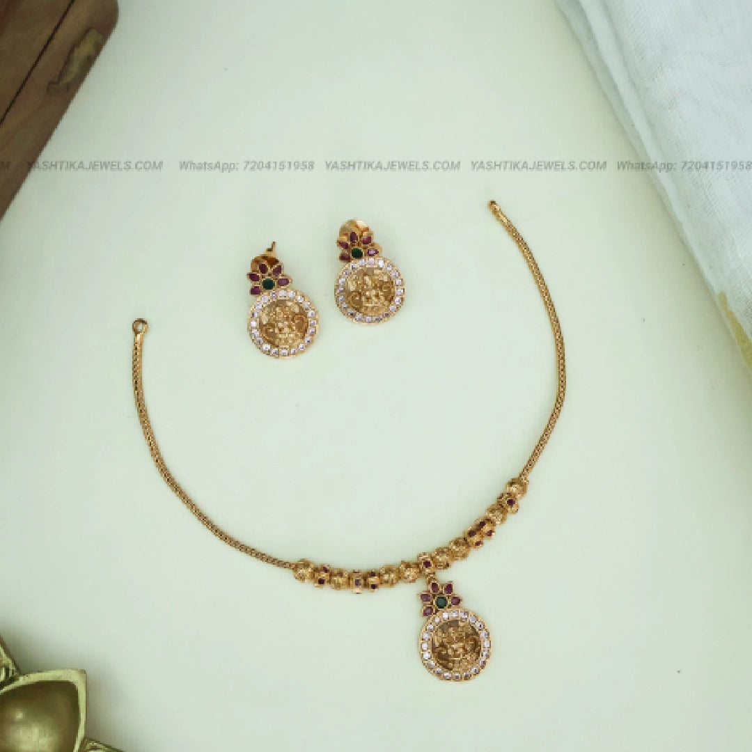 Lakshmi attigai necklace with beaded collar in antique gold finish
Matching earrings for Lakshmi attigai necklace set