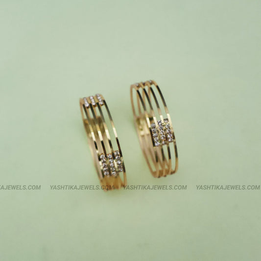 Gold inspired multi-line kids bangles with stone accent panel