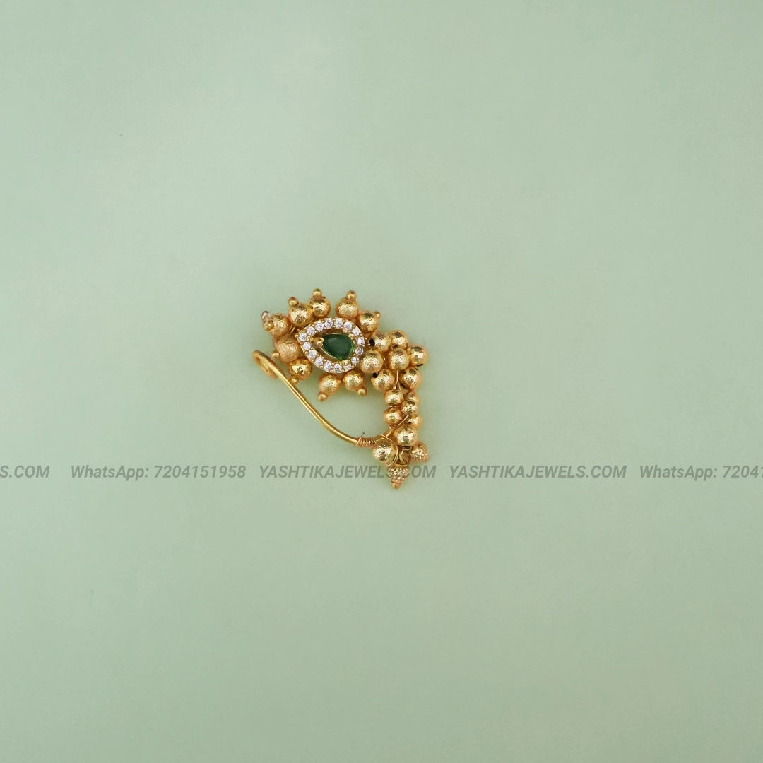 Antique gold nose clip with emerald stone and white stone border - skin friendly