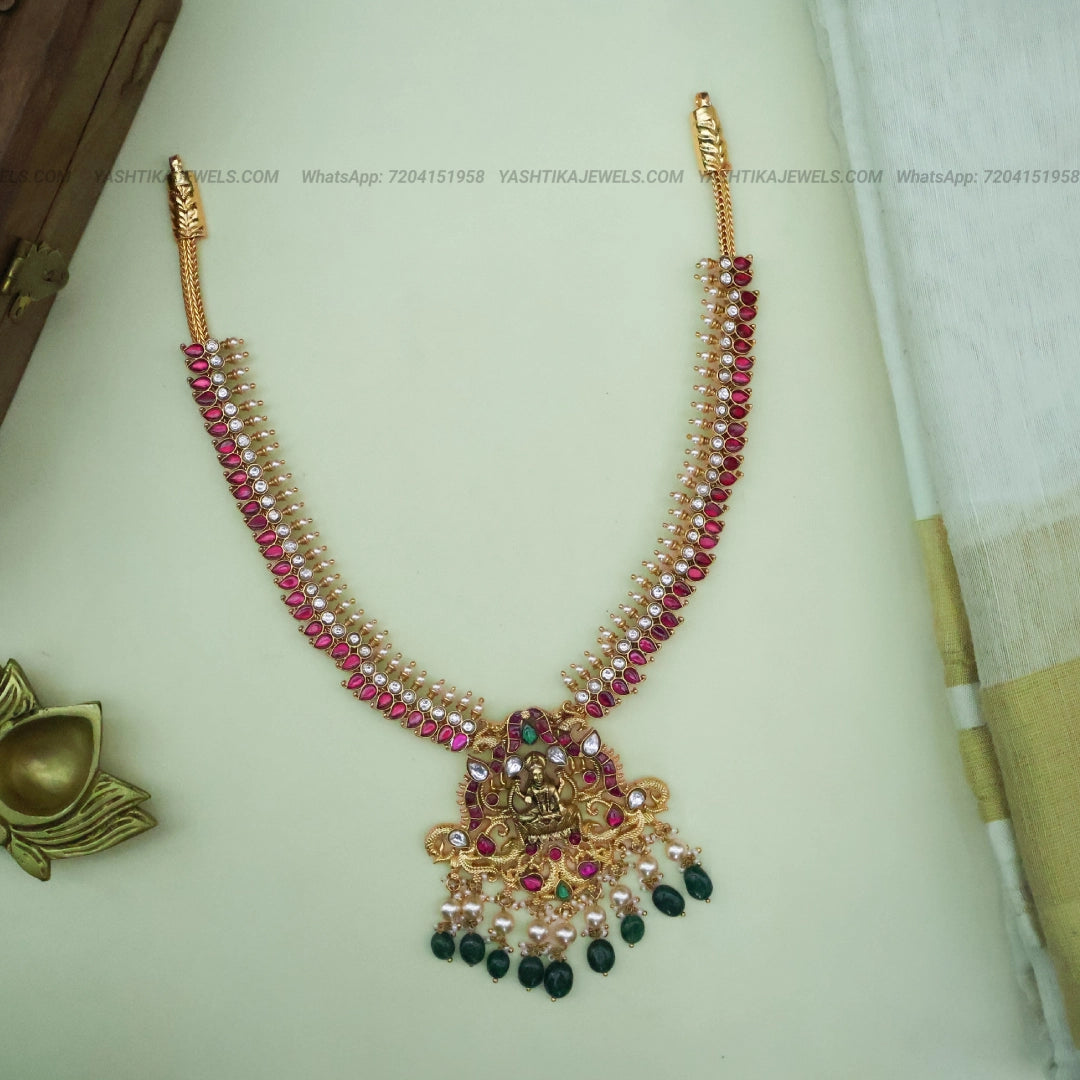 Handmade Lakshmi temple jadau neckpiece with ruby and emerald drop detailing