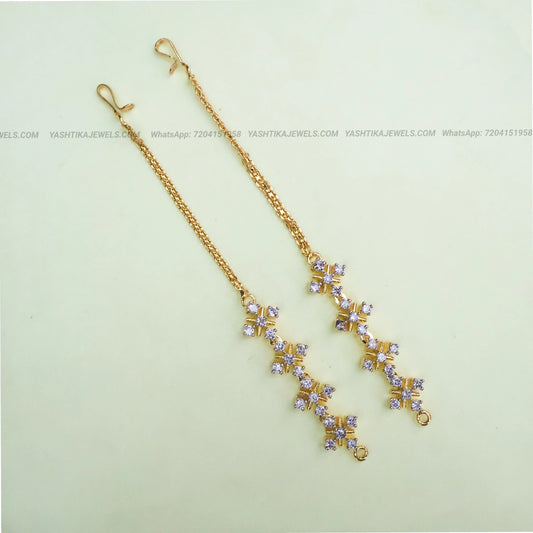 Gold-tone CZ stone ear chain with sparkling white stones in a floral geometric pattern
