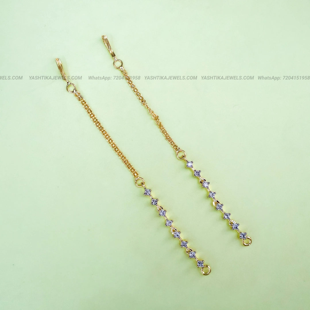 Gold-tone CZ stone ear chain featuring a fine chain and sparkling clear cubic zirconia stones