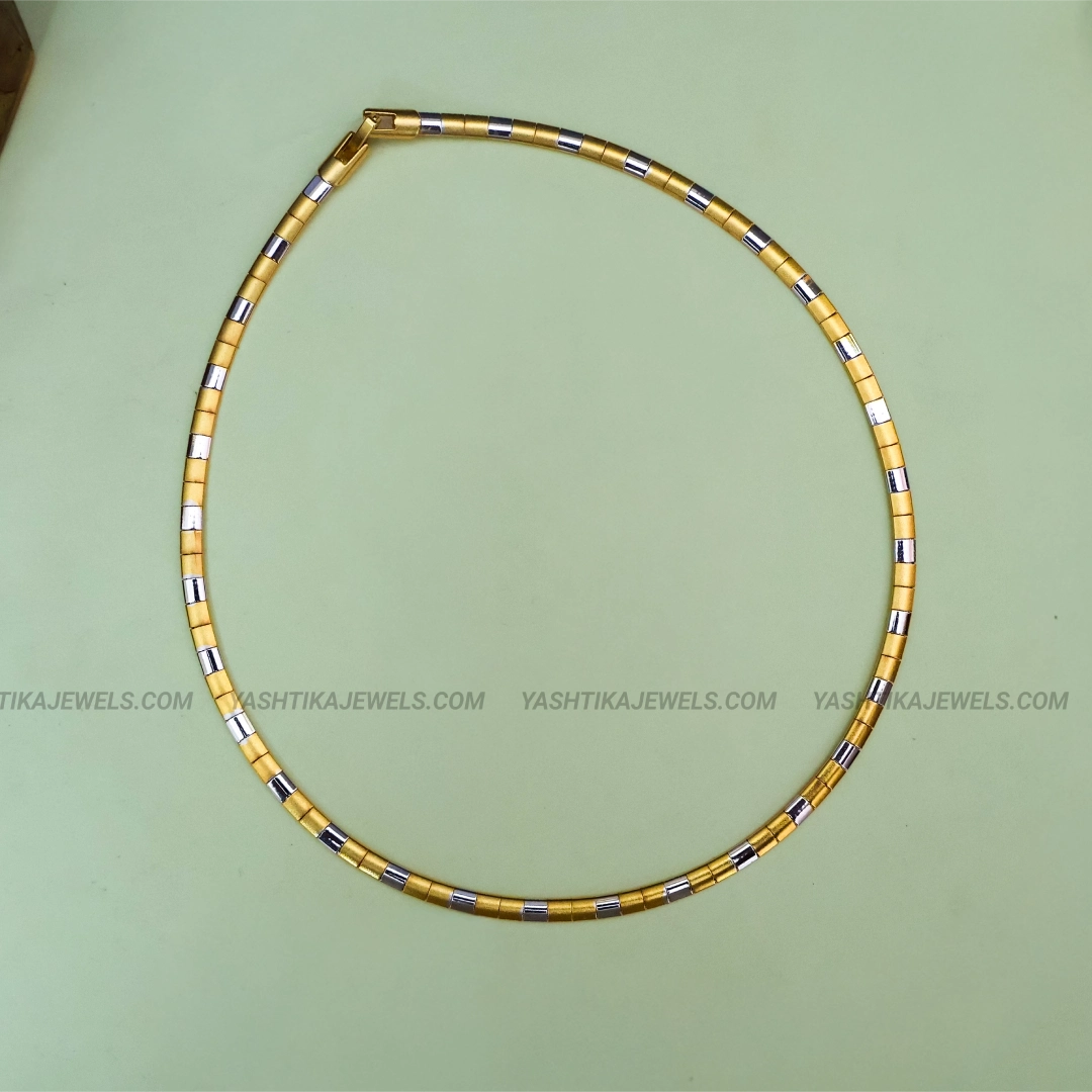 Gold-tone and silver-tone double-tone Hasli chain with alternating rectangular metallic accents.